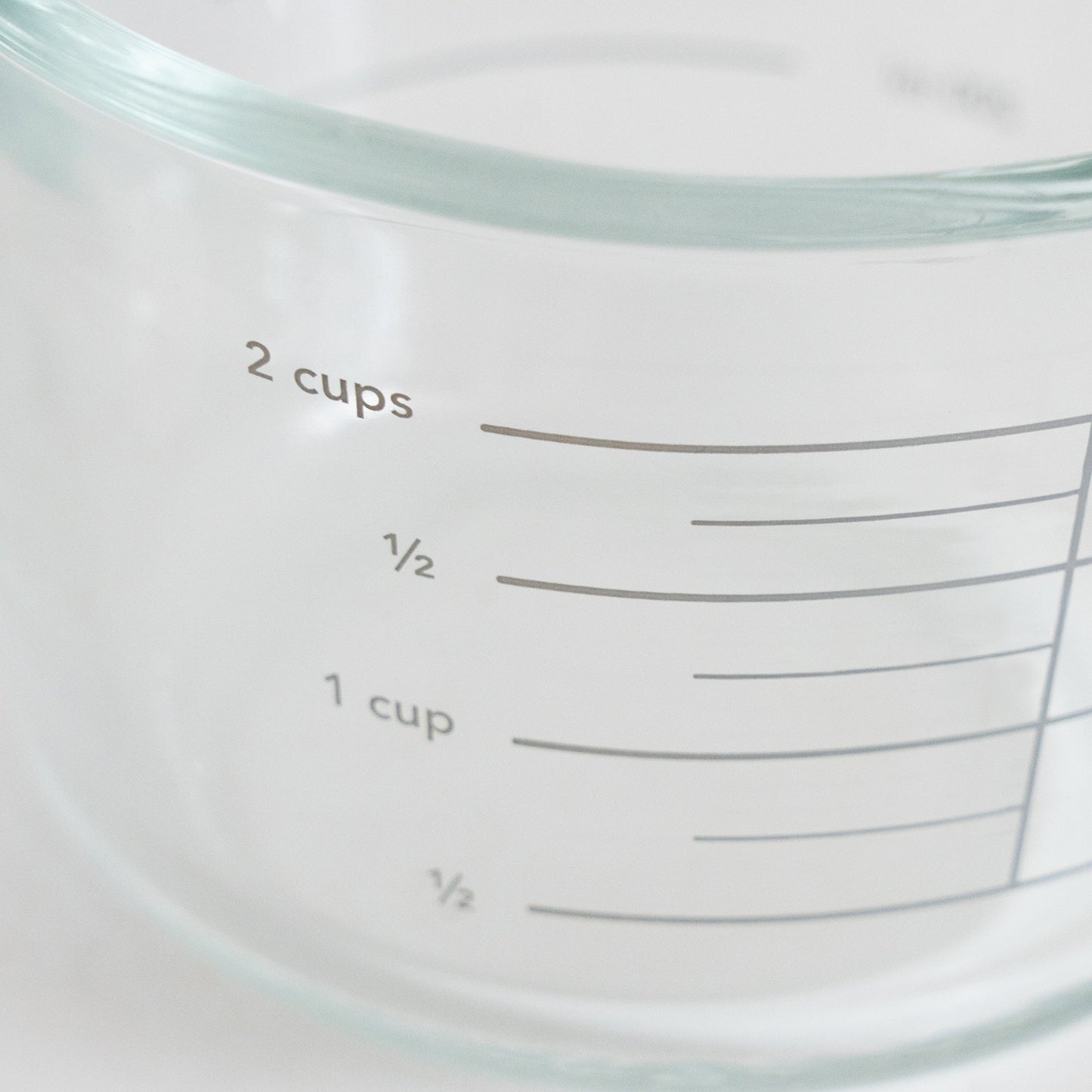 Glass Measuring Cup With Glass Citrus Juicer Lid